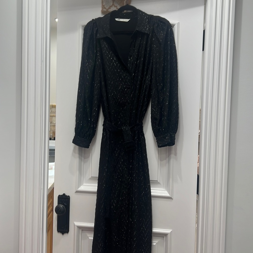 Beautiful black dress fancy yet understated long sleeve with a belt
